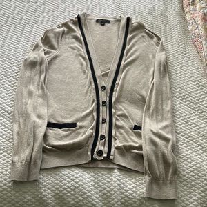 Beige cardigan with black trim